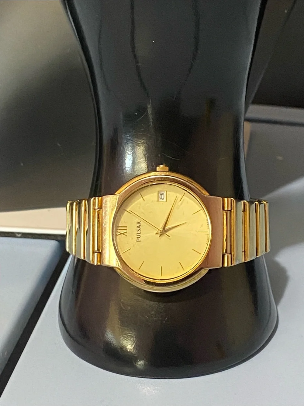 Pulsar Gold Watch Gold watch with gold dial, gold bracelet, and gold